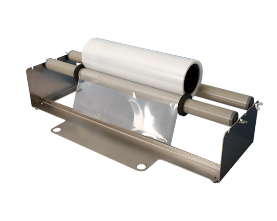 Portarotolo pellicola ISM - Garantisce uno svolgimento fluido della pellicola tubolare. 2 versioni disponibili: Portarotolo pellicola da posizionare dietro l'ISM su un tavolo, oppure Portarotolo pellicola da montare sul supporto. Nota: assicurarsi di ordinare l'ISM con funzione coltello inclusa.

