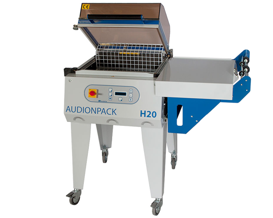 Audionpack H20 - Machine d'emballage sous film rétractable facile à utiliser qui scelle et rétrécit en une seule étape. Construction robuste, idéale pour les petites et moyennes quantités de production et pour emballer une grande variété de produits de différentes tailles. Équipé d'un grand ventilateur pour une circulation de l'air meilleure et plus égale, ce qui se traduit par une excellente capacité de rétraction et un emballage parfait !