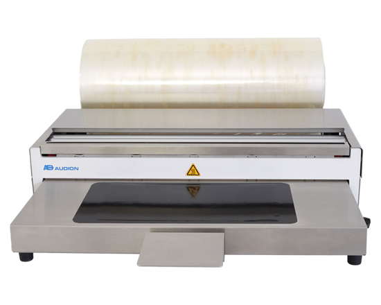 ASW450 - L'Audion Stretch Wrapper est une filmeuse compacte et facile à utiliser pour enrober sous film des produits alimentaires, des barquettes etc... avec un résultat final attrayant et présentable. Cette enveloppe se distingue  par sa solidité et sa grande qualité. La température réglable, le fil de coupe chauffé et le frein du rouleau de film garantissent un processus d'emballage sans effort avec des résultats finaux de haute qualité. Idéal pour une utilisation dans les magasins de produits frais, les supermarchés, les boucheries et les charcuteries, vous permettant de produire facilement jusqu'à 4 paquets par minute.